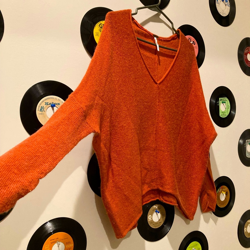 Free People light orange sweater